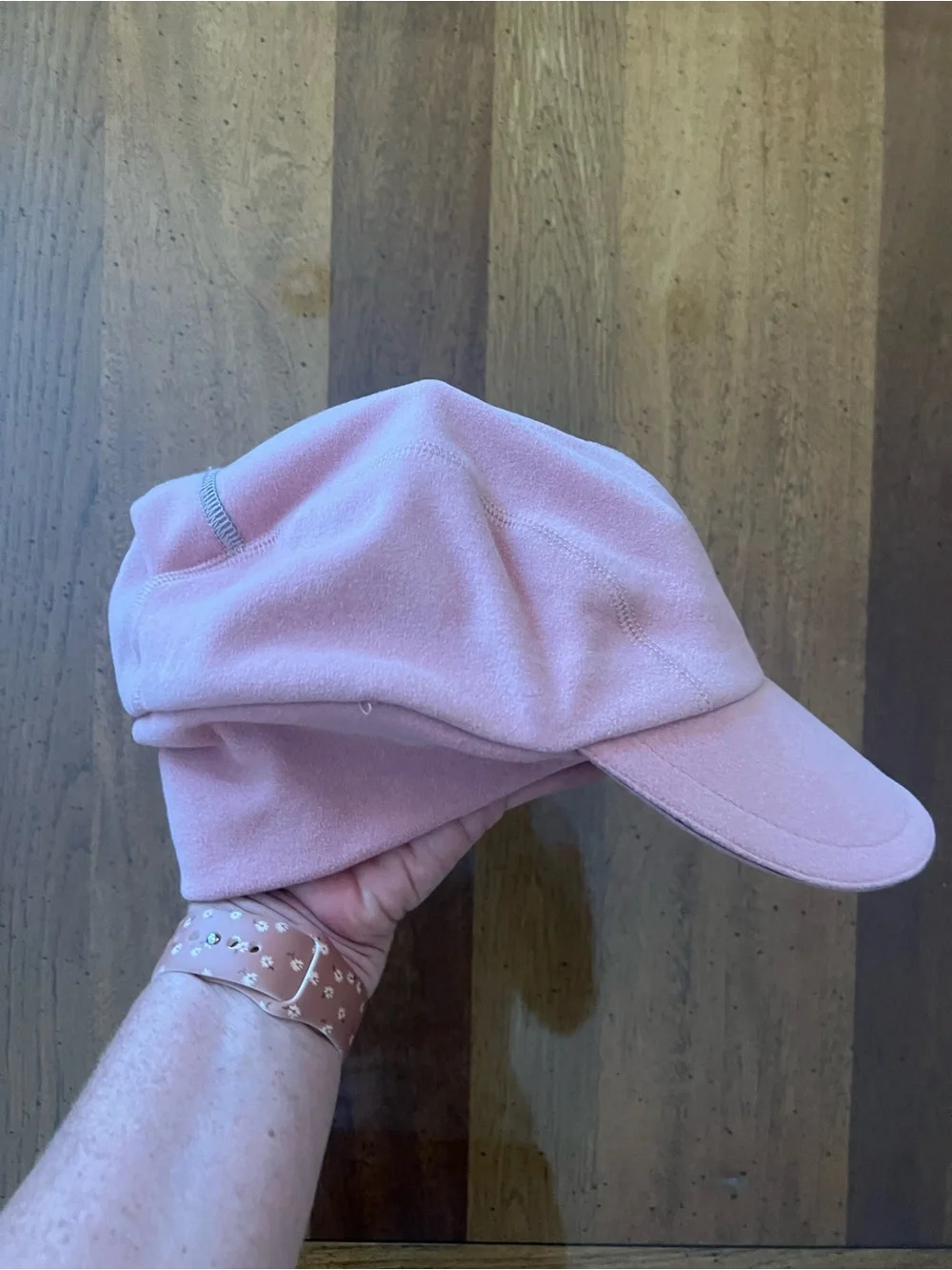 Pink fleece winter hat with ear covers